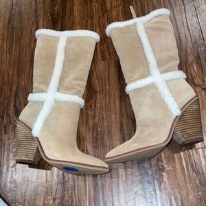 Mid length fur boots.